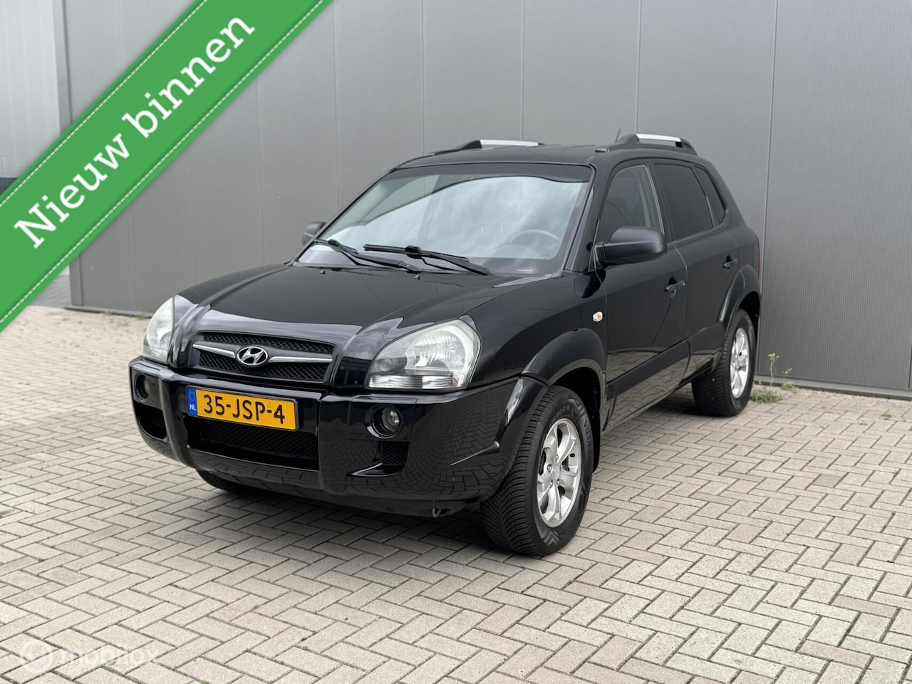 Hyundai Tucson - 2.0i Dynamic Executive 2.0i Dynamic Executive, A/C, Trekh, Cruise, - AutoWereld.nl
