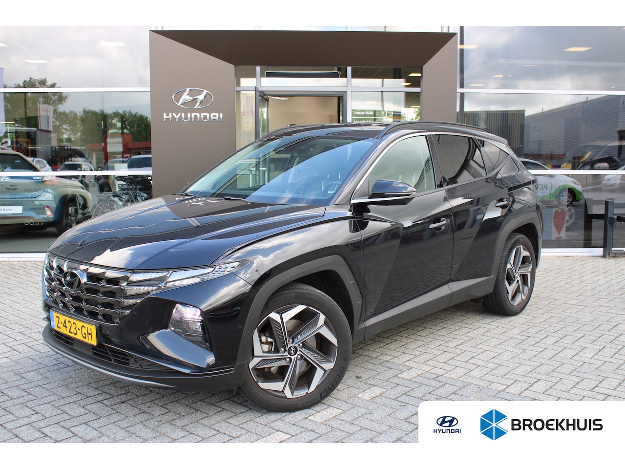 Hyundai Tucson - 1.6 T-GDI PHEV Premium 4WD | Lederen bekleding | Elektrisch bedienbare stoelen | 360 camer - AutoWereld.nl