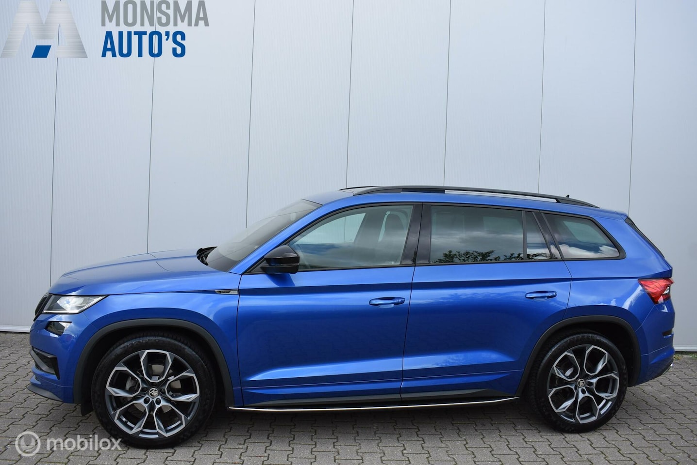 Skoda Kodiaq - 1.5 TSI Sportline Racing Blue Pano Canton Virtual Keyless 20" LMV Uitkl. trekhaak | Zeer m - AutoWereld.nl