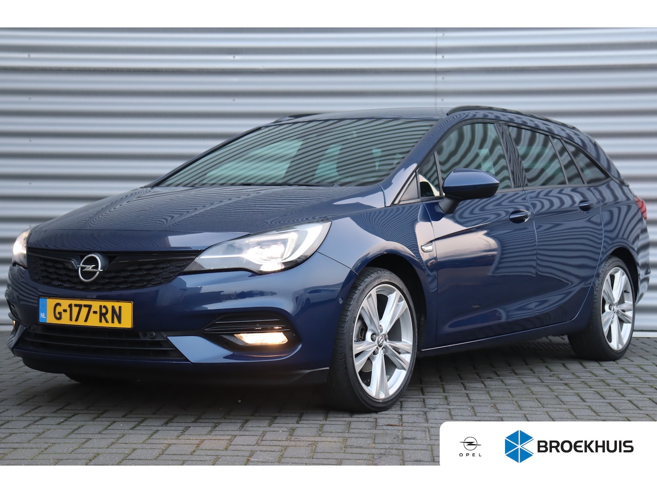 Opel Astra Sports Tourer - 1.2 TURBO 110PK LAUNCH ELEGANCE+ / NAVI / LEDER / CLIMA / FULL-LED / PDC / CAMERA / 18" LM - AutoWereld.nl