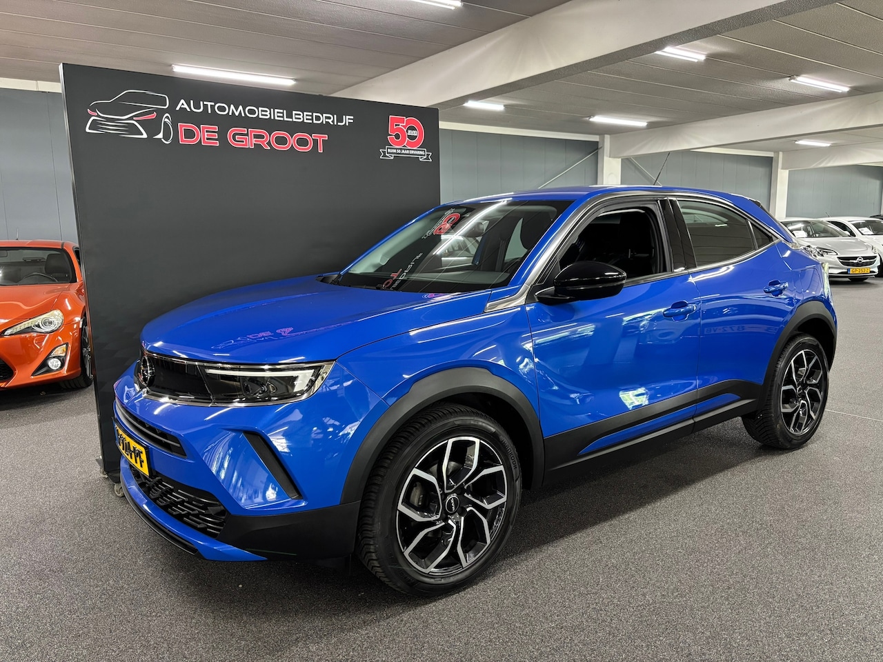 Opel Mokka - 1.2 Edition / Radio, Navi, Stuur en stoelverwarming, Airco - AutoWereld.nl