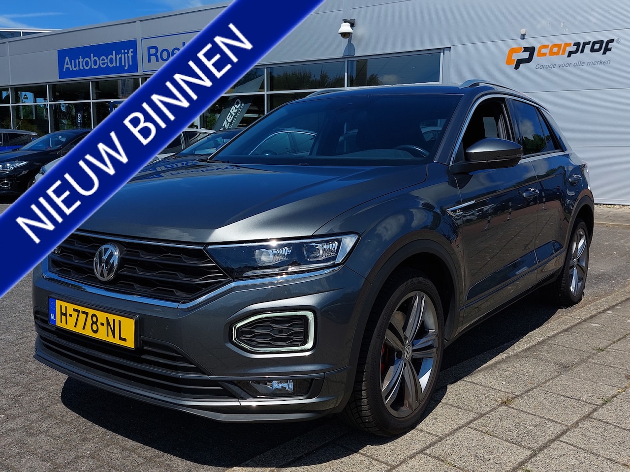 Volkswagen T-Roc - 1.5 TSI 150pk Sport Business R | Origineel NL | Navi | Apple Carplay+Android Auto | Clima - AutoWereld.nl