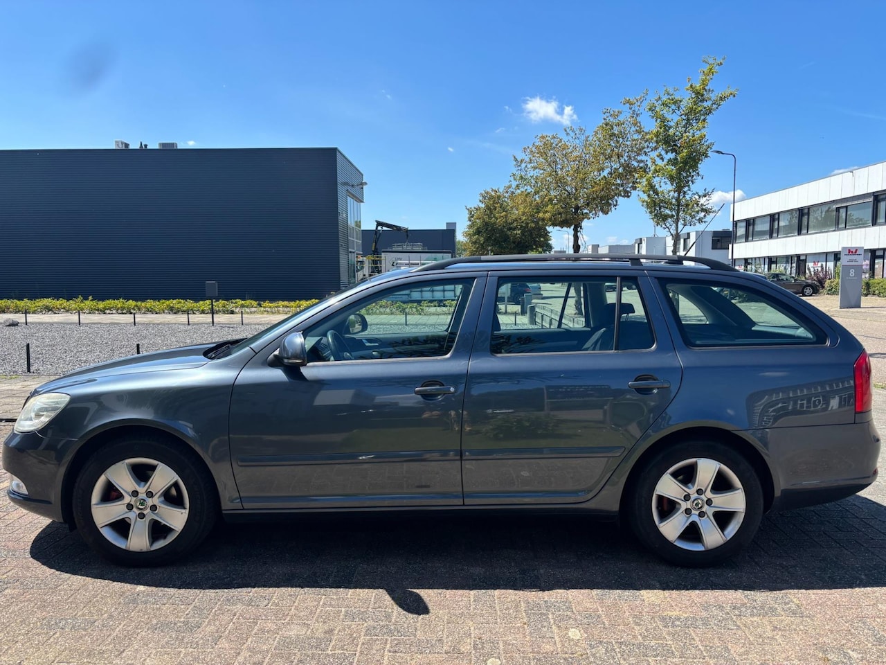 Skoda Octavia Combi - 1.4 TSI Ambition Business Line Airco - AutoWereld.nl