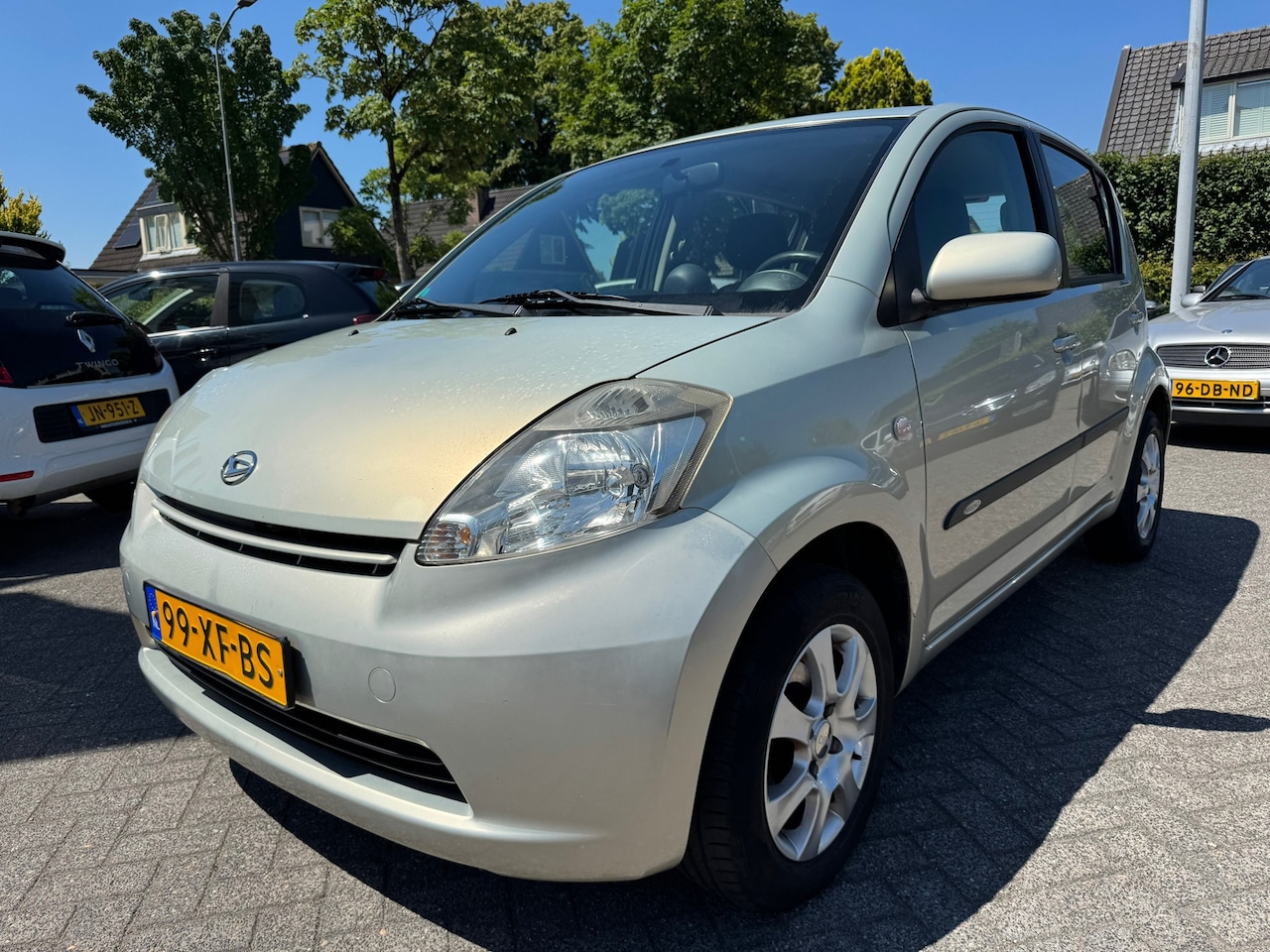 Daihatsu Sirion 2 - 1.3-16V Comfort 1.3-16V Comfort 87pk,Airco,Apk 18/11/25,Nap,Trekhaak - AutoWereld.nl