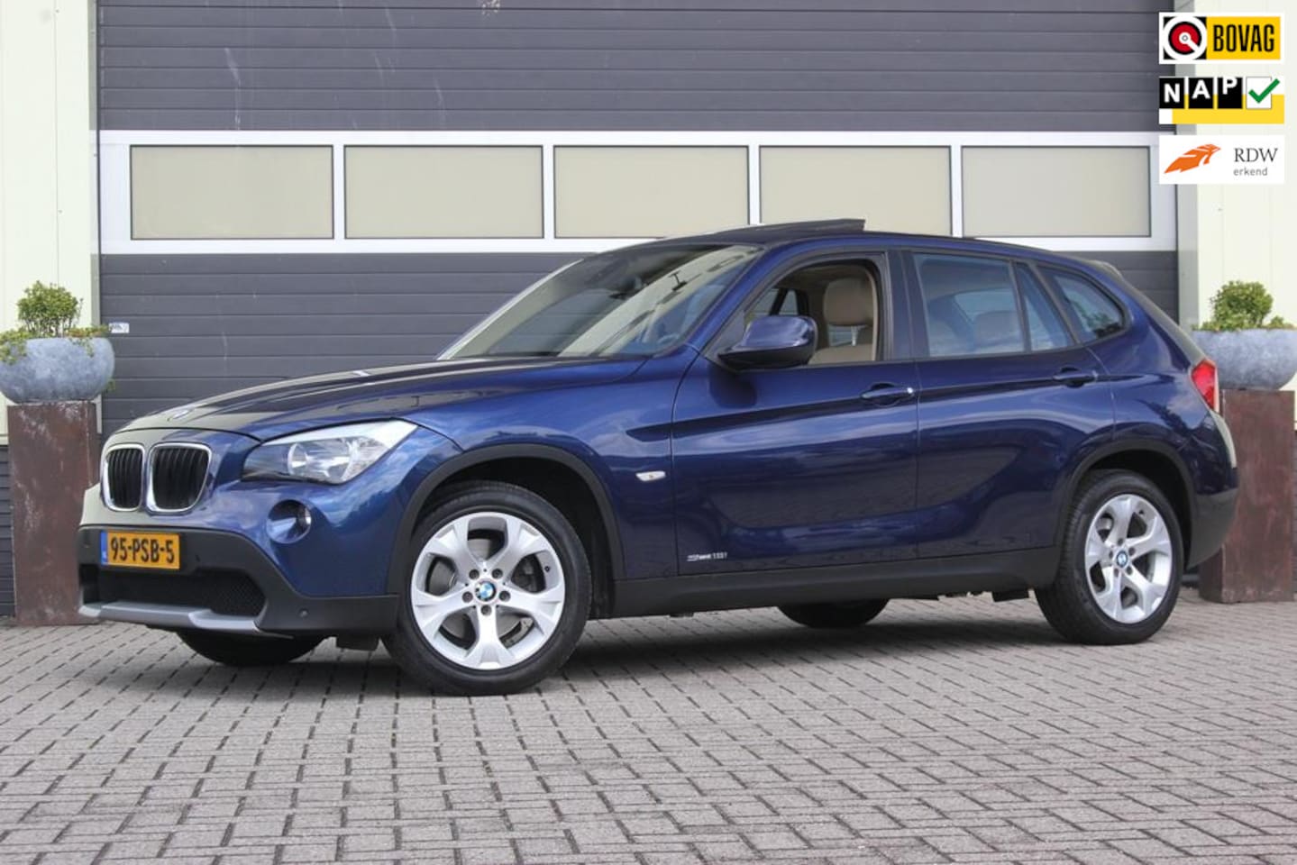 BMW X1 - SDrive18i Executive | Trekhaak | Panoramadak | - AutoWereld.nl