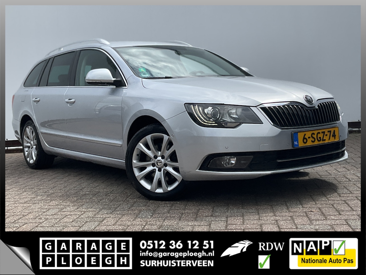 Skoda Superb Combi - 1.4 TSI Ambition Business Clima Cruise Navi Trekhaak Ruimte - AutoWereld.nl