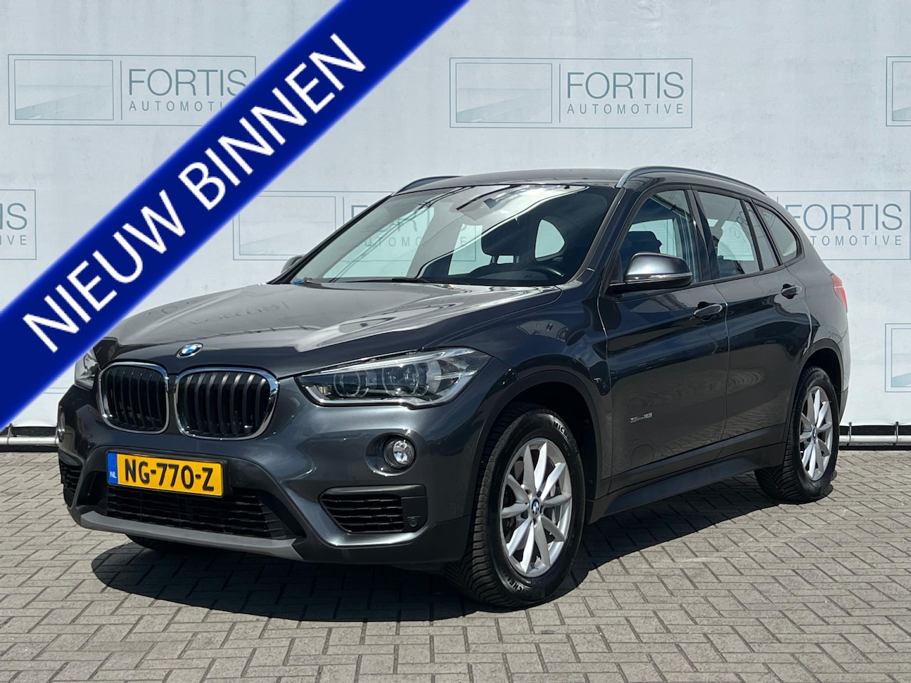 BMW X1 - sDrive18i Centennial High Executive NL AUTO | CAMERA | STOELVERW | NAVI | TREKHAAK | - AutoWereld.nl