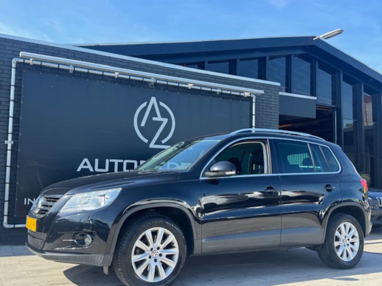 Volkswagen Tiguan - 1.4 TSI Sport&Style - AutoWereld.nl
