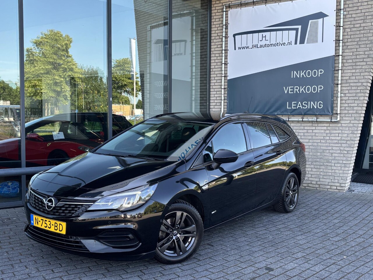 Opel Astra Sports Tourer - 1.2 Design & Tech*NAVI*ECC*CRUISE*HAAK*CAMERA - AutoWereld.nl