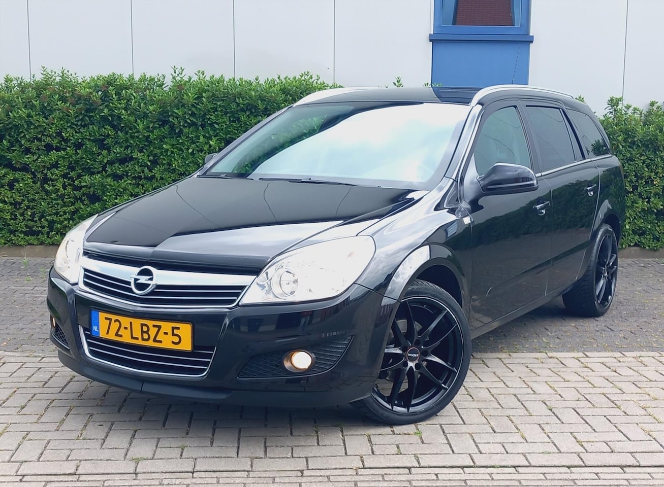 Opel Astra - 1.6 16V ST.WGN 85KW Cosmo Airco/Leder/Navigatie - AutoWereld.nl