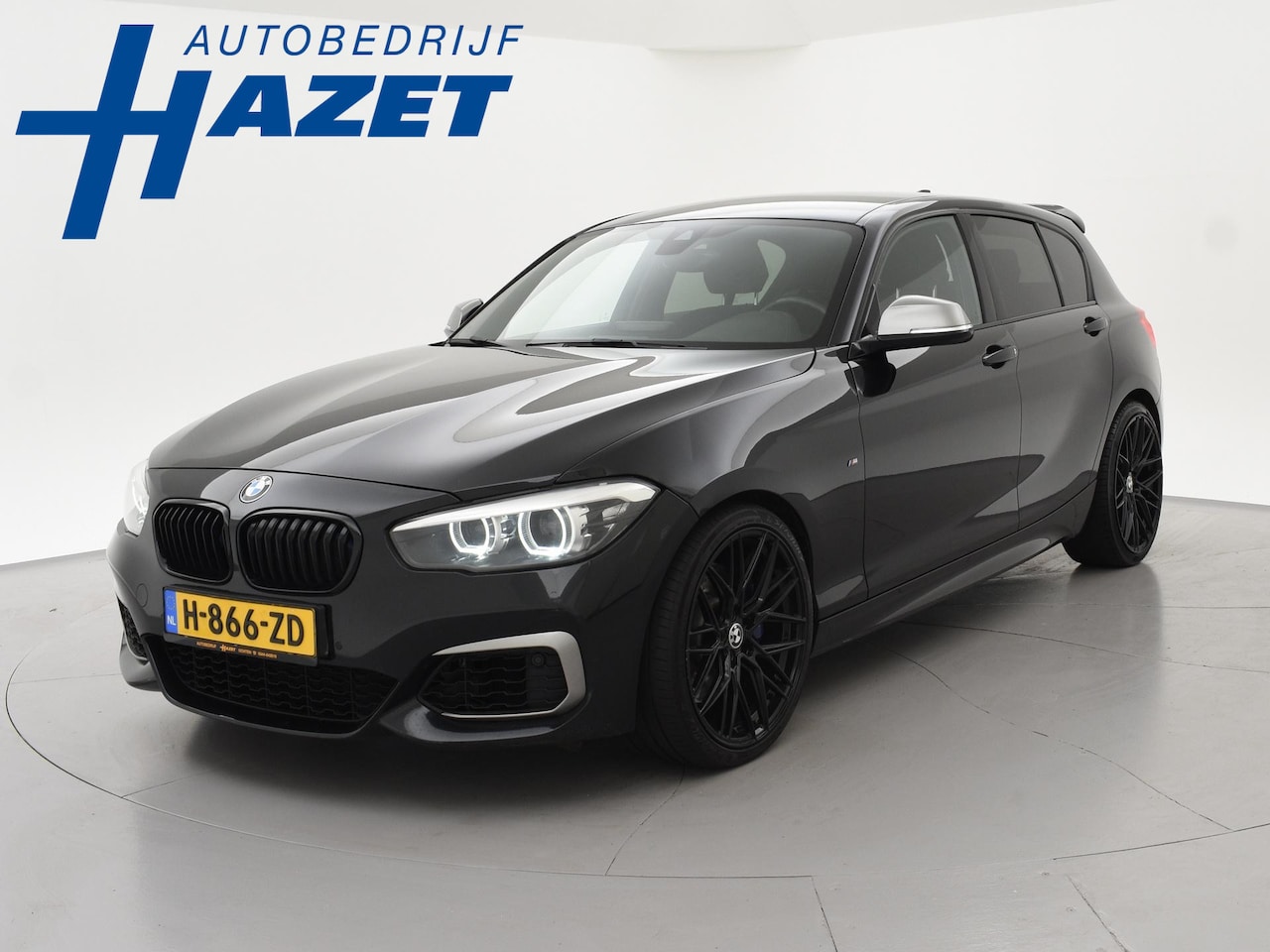 BMW 1-serie - M140i 340 PK M-SPORT AUT8 + HARMAN/KARDON | 19 INCH | SPORTUITLAAT | CAMERA | STOELVERWARM - AutoWereld.nl