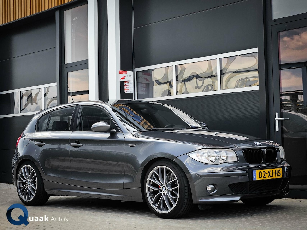 BMW 1-serie - 116i Sport |18 INCH | NW. KETTING | SPORTSTOELEN | ORG. NL - AutoWereld.nl