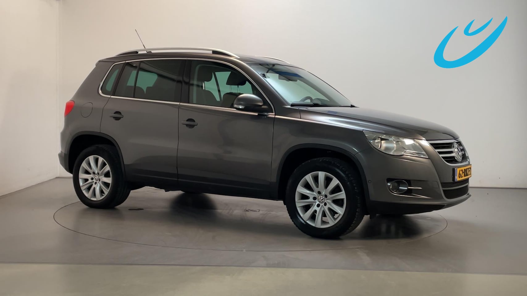 Volkswagen Tiguan - 1.4 TSI 150pk Sport&Style Navigatie Parkeersensoren Climate Control - AutoWereld.nl