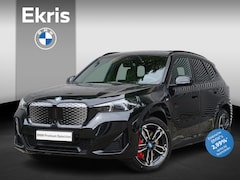 BMW iX1 - eDrive20 M Sportpakket Pro | Travel Pack | 19 inch LM M Dubbelspaak (Styling 871 M) | Trek