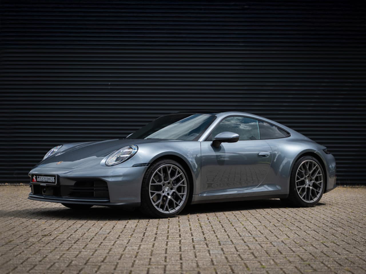Porsche 911 - 992.2 3.0 Carrera FACELIFT l Vanadium Grey l BTW l Vol - AutoWereld.nl