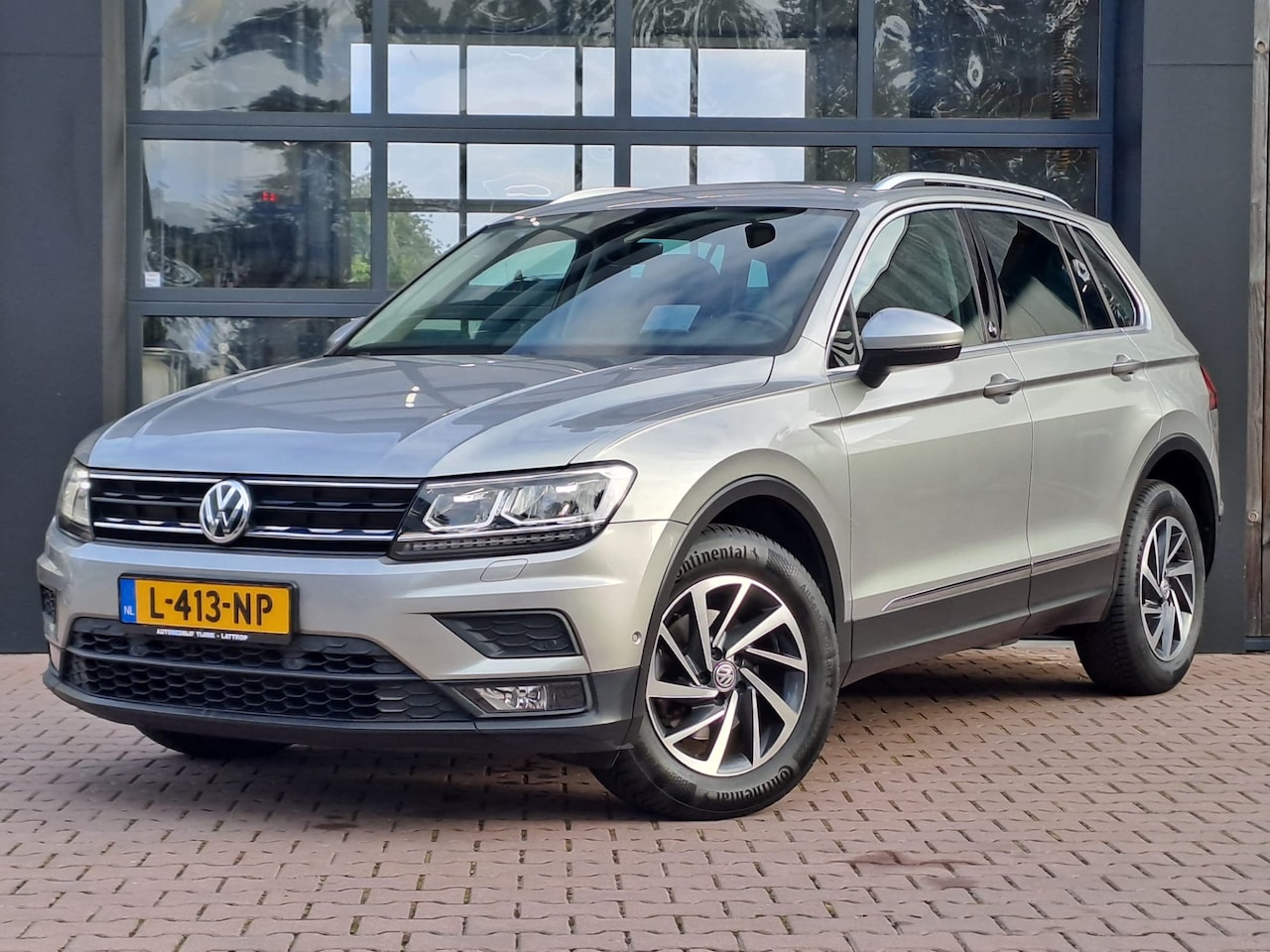 Volkswagen Tiguan - 1.4 TSI 4MOTION Highline | ACC | Led | App-connect | Stoelverwarming | Navi | All-seasons - AutoWereld.nl