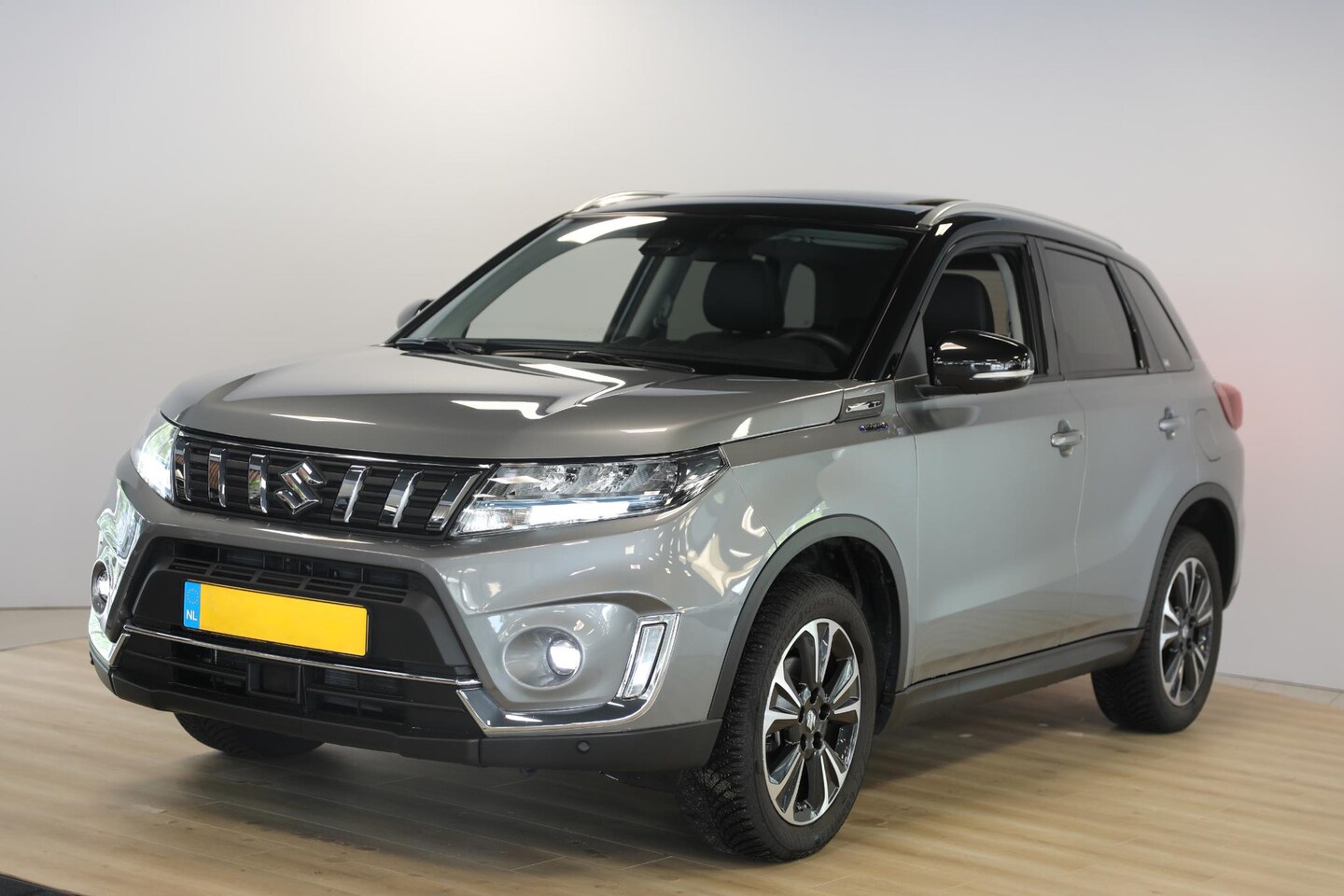 Suzuki Vitara - 1.5 Hybrid Style | Schuif- opendak | Cruise Adaptief - AutoWereld.nl