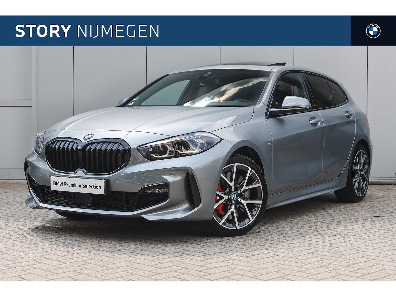 BMW 1-serie - 118i High Executive M Sport Automaat / Panoramadak / M Sport Steering / Achteruitrijcamera - AutoWereld.nl