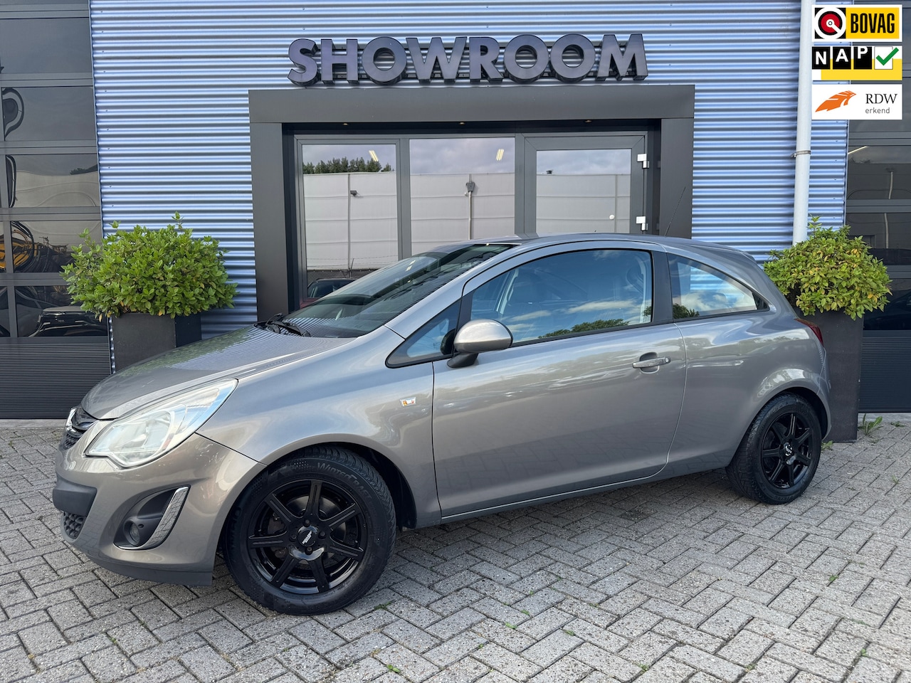 Opel Corsa - 1.4-16V Anniversary Edition Navi|Airco|Media - AutoWereld.nl