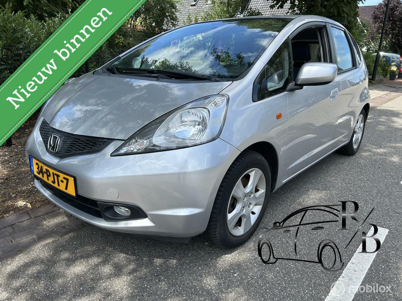 Honda Jazz - 1.2 Style Mode LEES TEKST APK AIRCO LAGE KM - AutoWereld.nl