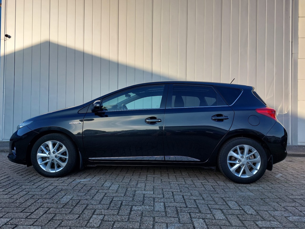 Toyota Auris - 1.8 Hybrid Lease Clima Cruise Navi Camera PDC - AutoWereld.nl