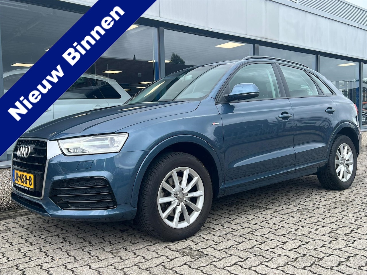 Audi Q3 - 1.4 TFSI Adrenalin Navi/PDC/Trekhaak/LM - AutoWereld.nl