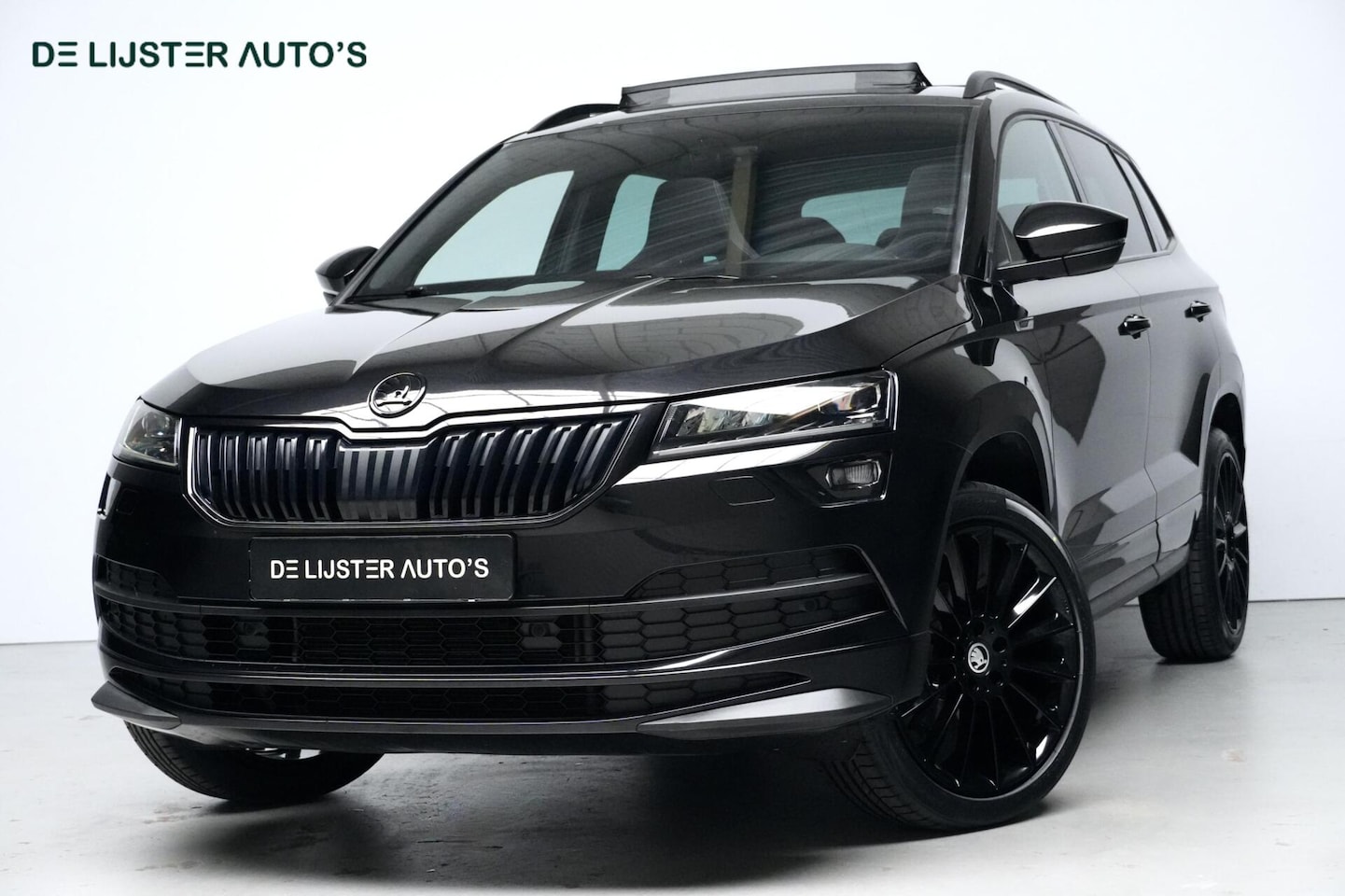 Skoda Karoq - 1.5 TSI ACT Sportline Automaat | Pano-dak | Virtual | CarPlay | Acc | Camera | Stoel + Stu - AutoWereld.nl
