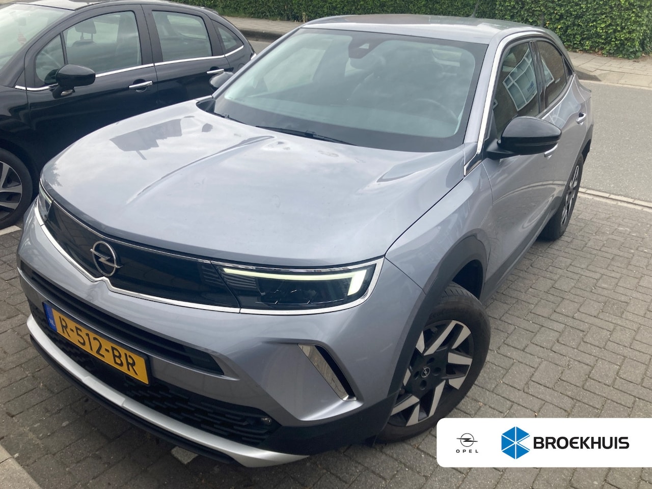 Opel Mokka - 1.2 Turbo Elegance | Airco| Camera | Cruise | Automaat | Trekhaak | Lage km stand ! | - AutoWereld.nl