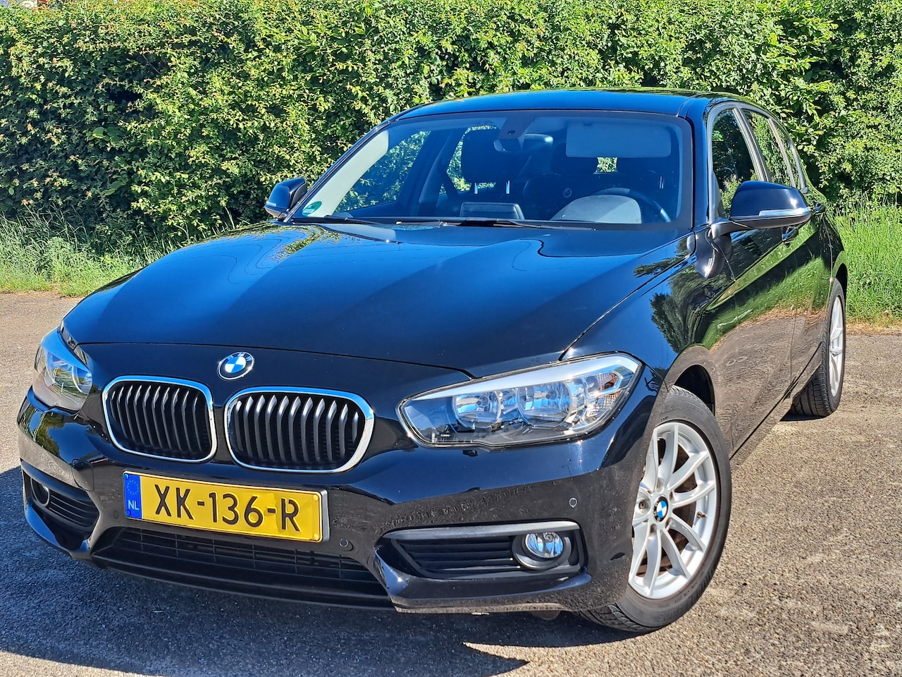 BMW 1-serie - 116i Sport 63190km Cruise/ Clima/ Stoelverw/ Bluetooth/Stuurbed. - AutoWereld.nl