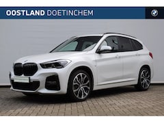 BMW X1 - sDrive20i High Executive M Sport Automaat / Panoramadak / Trekhaak / Sportstoelen / Achter