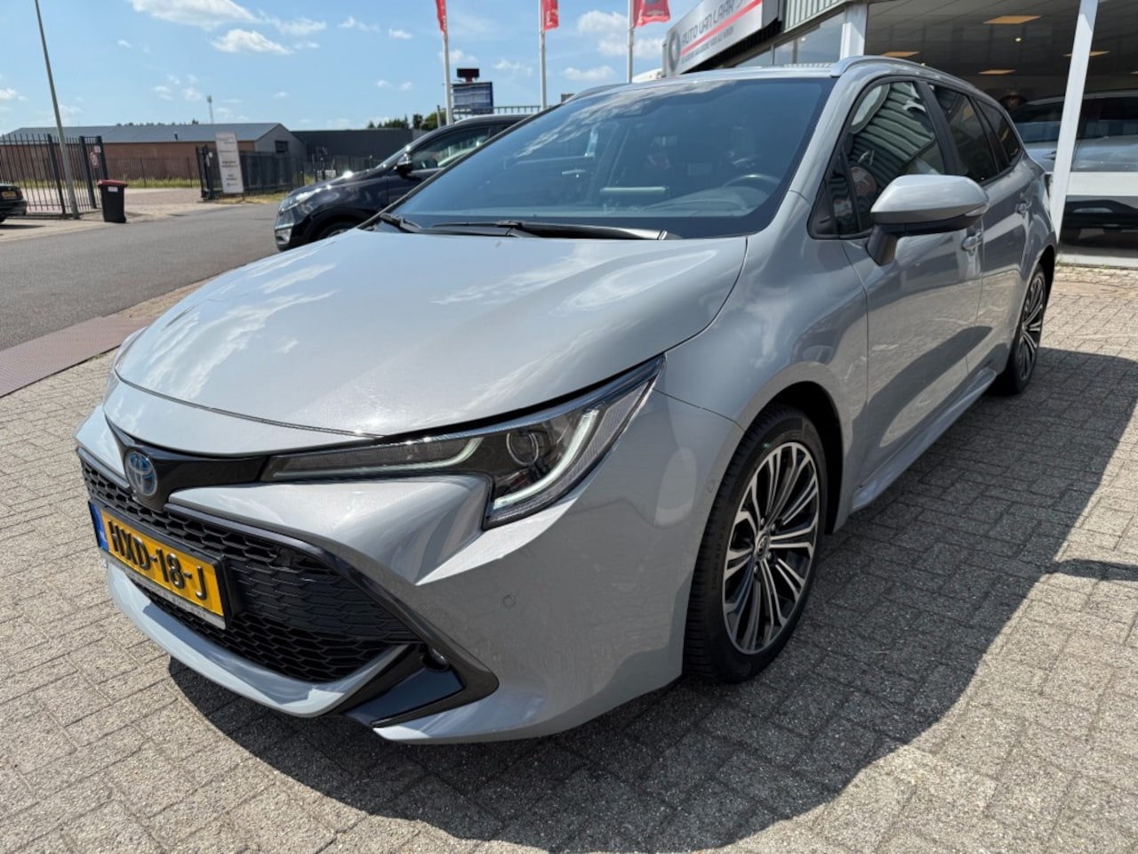Toyota Corolla Touring Sports - Touring Sports 1.8 Hybrid TEAM D - AutoWereld.nl