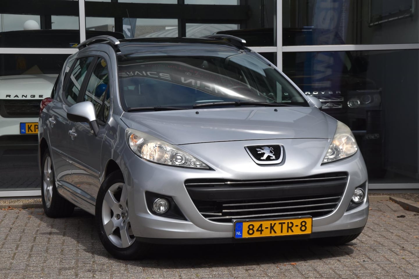 Peugeot 207 SW - 1.6 VTi XS Airco Nav. Pano. dak Pdc Trekhaak 1ste Eigenaar - AutoWereld.nl