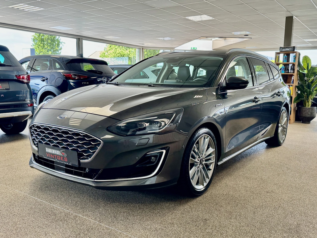 Ford Focus Wagon - 1.5 EcoBoost Vignale Full Options Leder PDC LMV NAVI Zeer Compleet - AutoWereld.nl