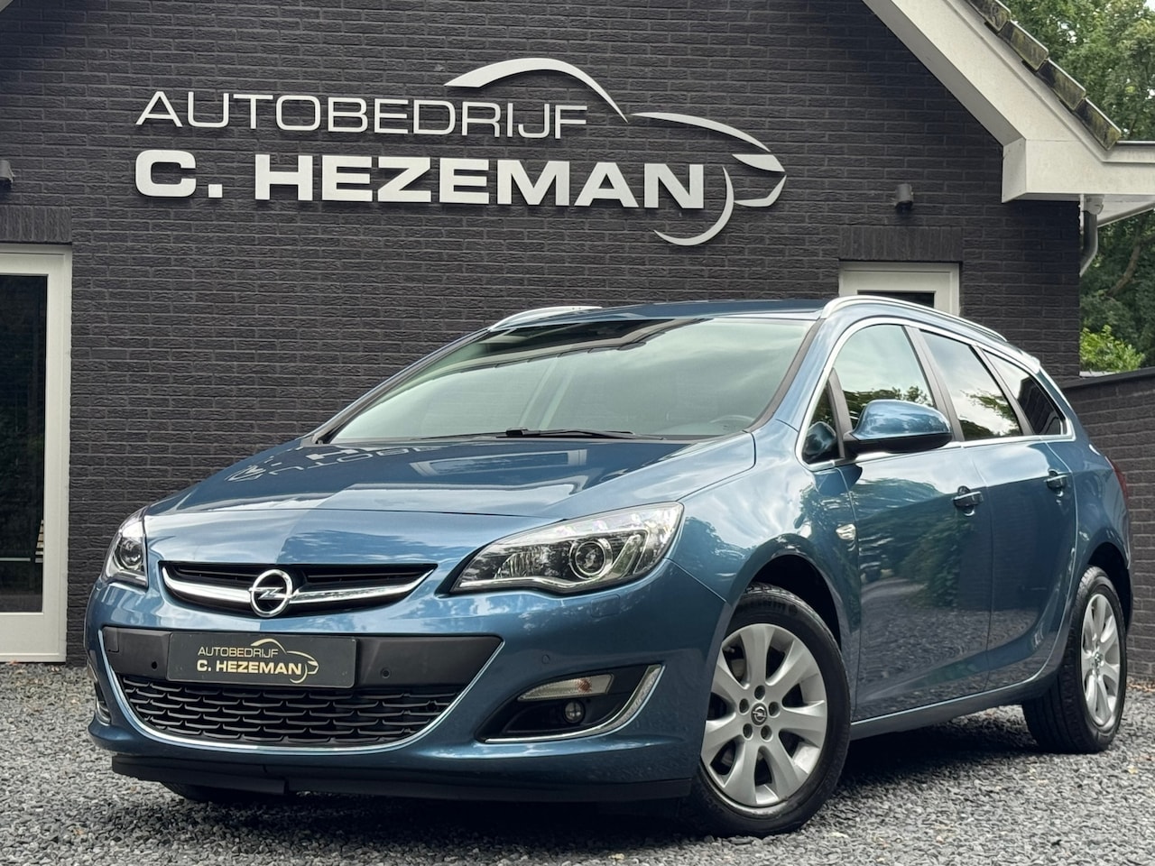 Opel Astra Sports Tourer - 1.4 Turbo Business + 1E EIGENAAR NAVI CRUISE XENON CAMERA - AutoWereld.nl