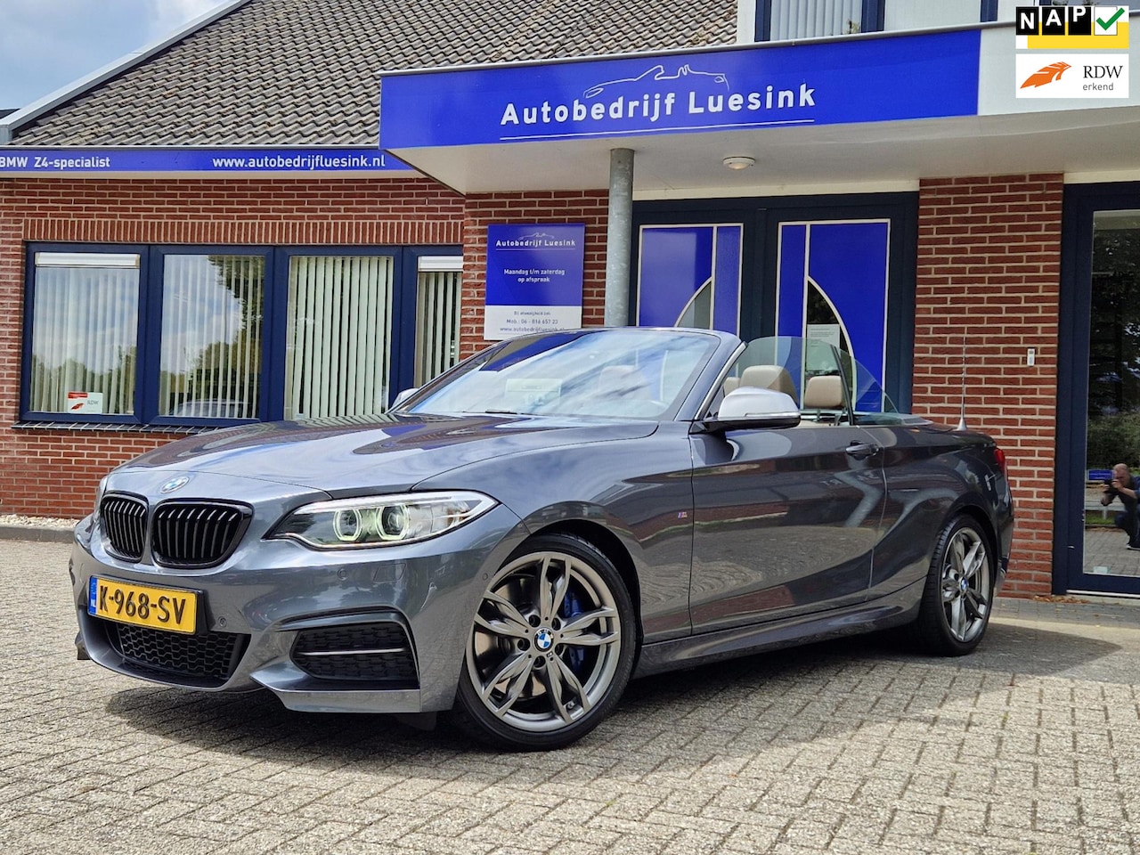 BMW 2-serie Cabrio - M240i High Executive M-Sport Stuurwielverwarming Camera Elektrische Stoelen met Memory Key - AutoWereld.nl