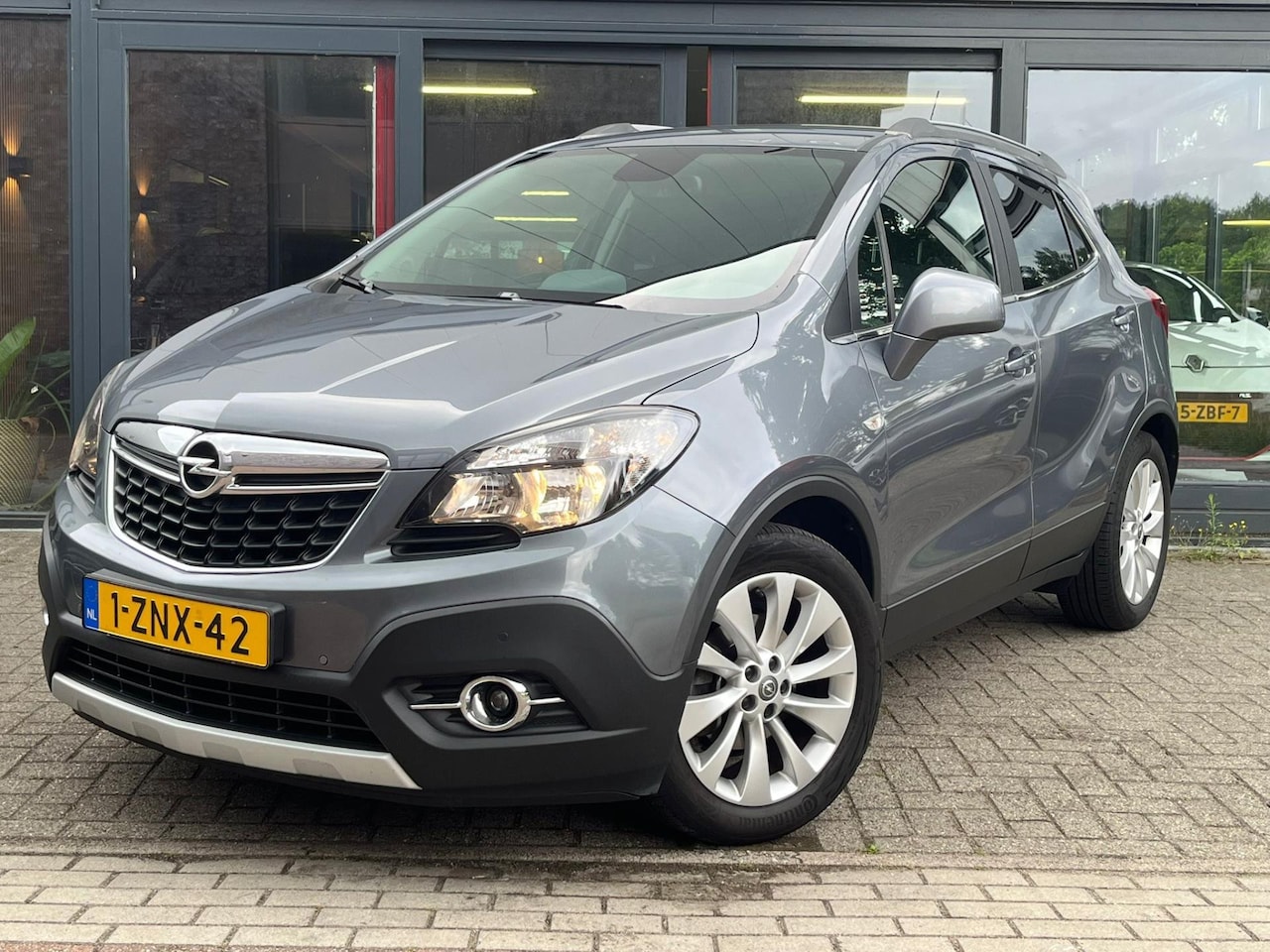Opel Mokka - 1.4 T Cosmo | Stoel+Stuur verwarming | Trekhaak 1200kg | Parkeersensoren voor+achter | Cru - AutoWereld.nl