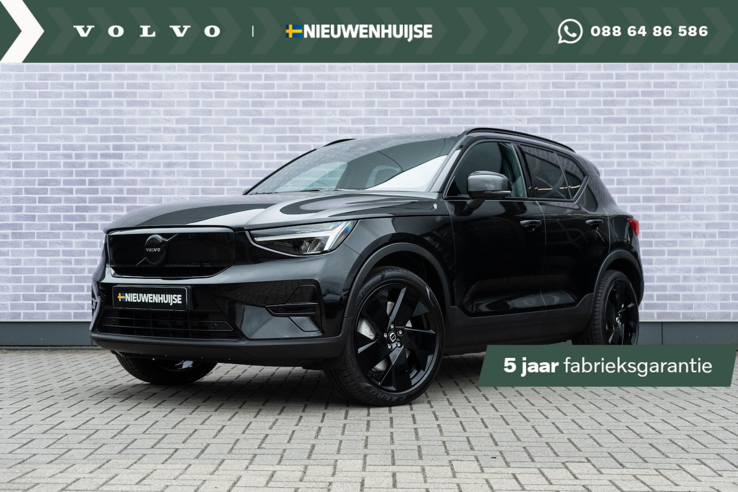 Volvo EX40 - Black Edition Plus Extended Range | Op voorraad | Warmtepomp | 20" | Donker glas | Premium - AutoWereld.nl