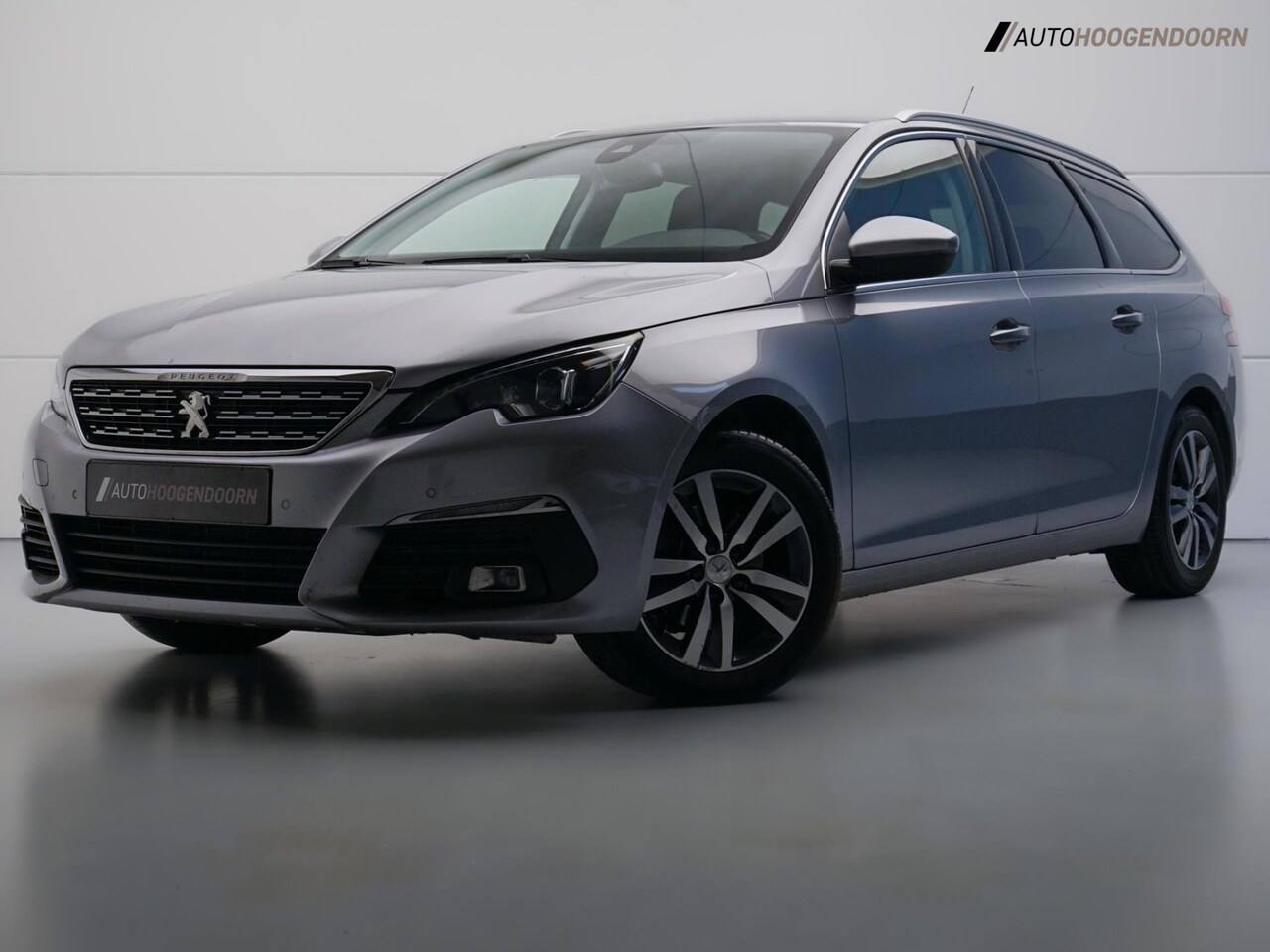 Peugeot 308 SW - 1.2 PureTech Allure (AUTOMAAT,APPLE CARPLAY,LED,CAMERA,CLIMATE,CRUISE,KEYLESS,SPORTSTOELEN - AutoWereld.nl
