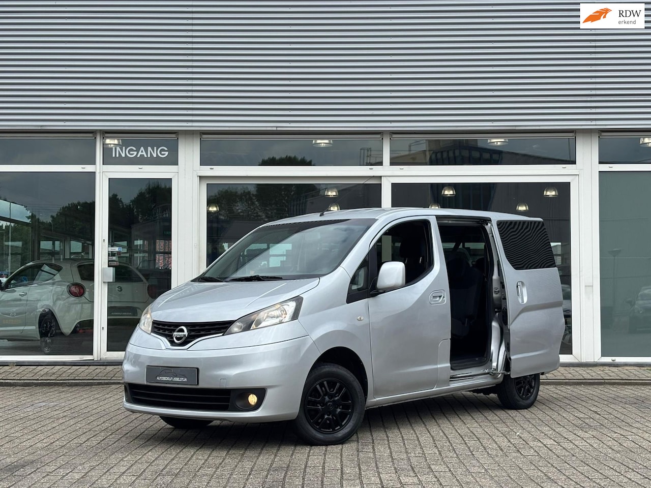 Nissan NV200 - 1.6 Evalia / 7 PERSOONS / Airco / Navi / Cruise Control. - AutoWereld.nl