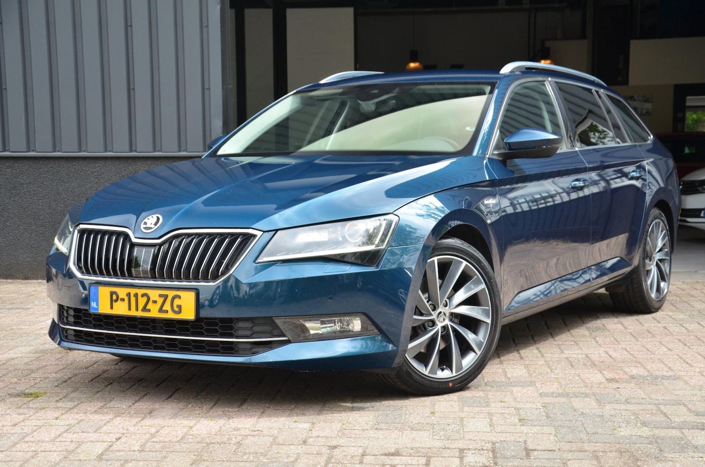 Skoda Superb Combi - 1.8 TSI Sportline Business CarPlay|AUT|Memory - AutoWereld.nl