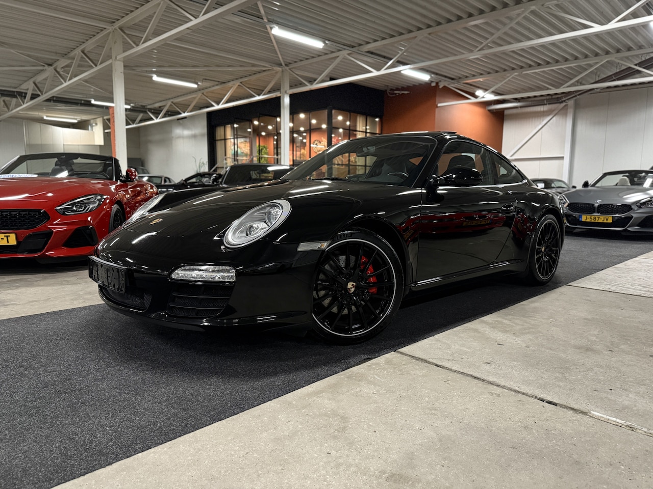 Porsche 911 - [997.2] 3.8 Carrera S Coupé PDK l Sport Chrono l Schuifdak l Cruise l Elek. comfortstoelen - AutoWereld.nl