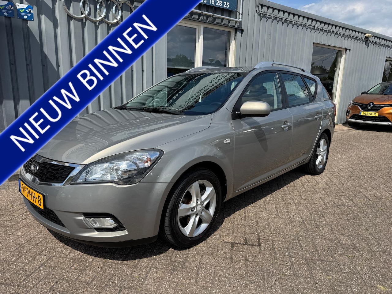 Kia Cee'd Sporty Wagon - 1.4 CVVT Seven 1.4 CVVT Seven - AutoWereld.nl
