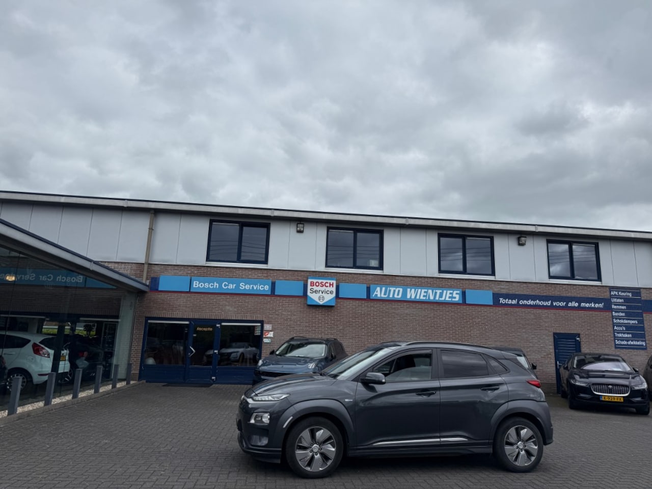 Hyundai Kona Electric - EV Premium 64kWh | Leer | Navi - AutoWereld.nl