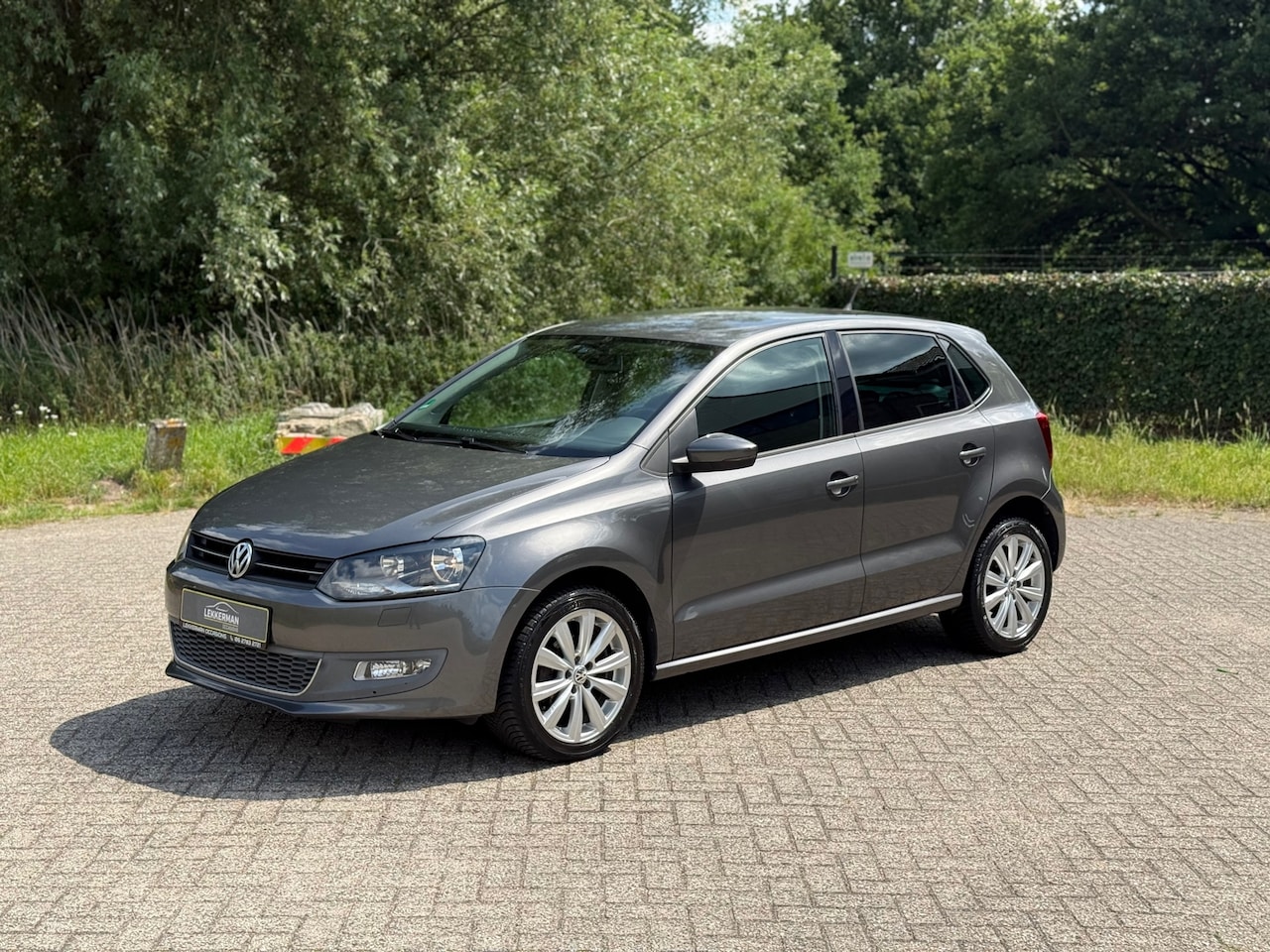 Volkswagen Polo - 1.2 TSI Highline DSG I CRUISE I CLIMA I PDC I WEINIG KM - AutoWereld.nl