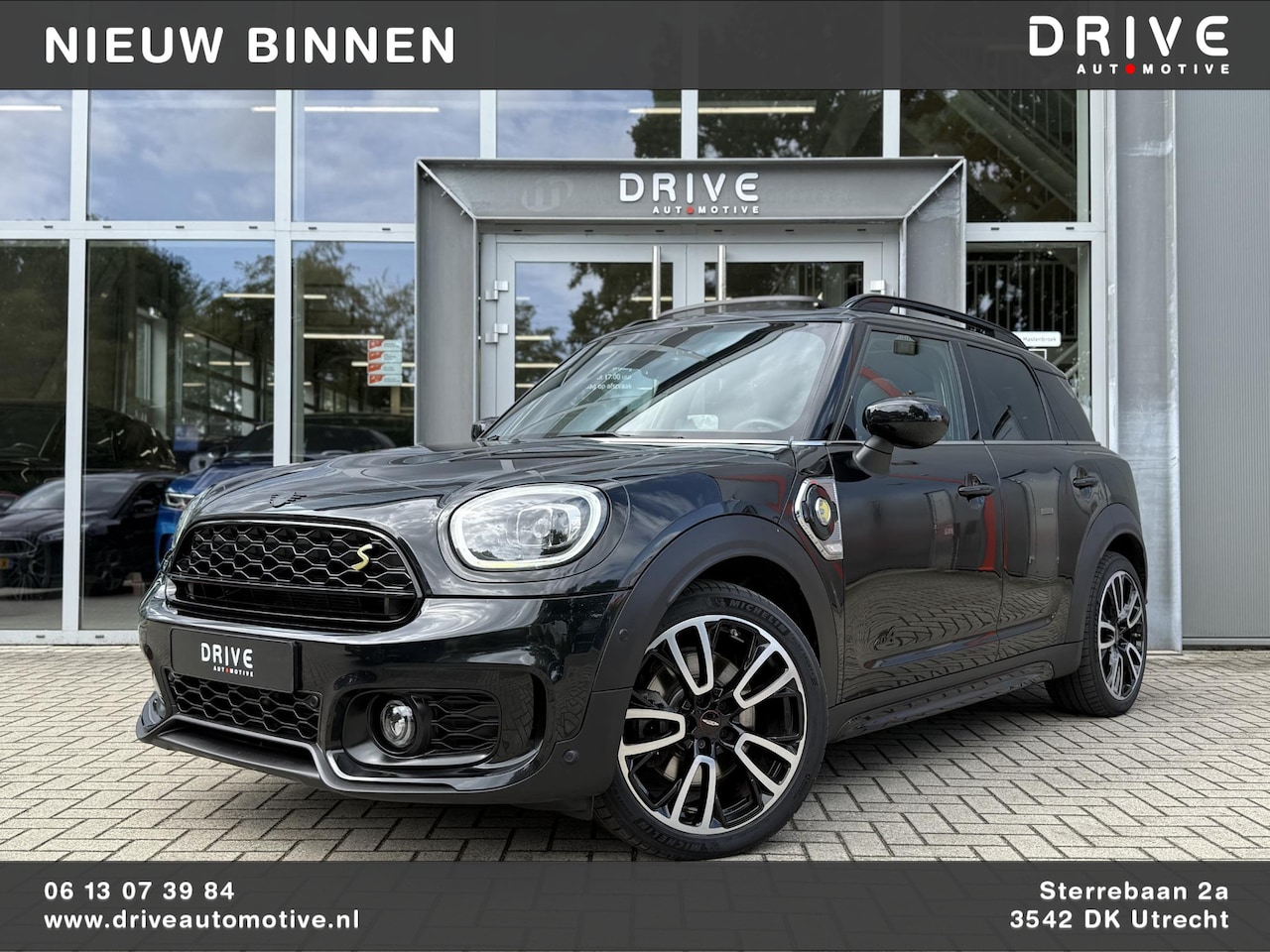 MINI Countryman - Mini 2.0 Cooper S E ALL4 John Cooper Works SOH93%|Sports Seat|Pano|H&K|Ad.Cruise|HUD - AutoWereld.nl