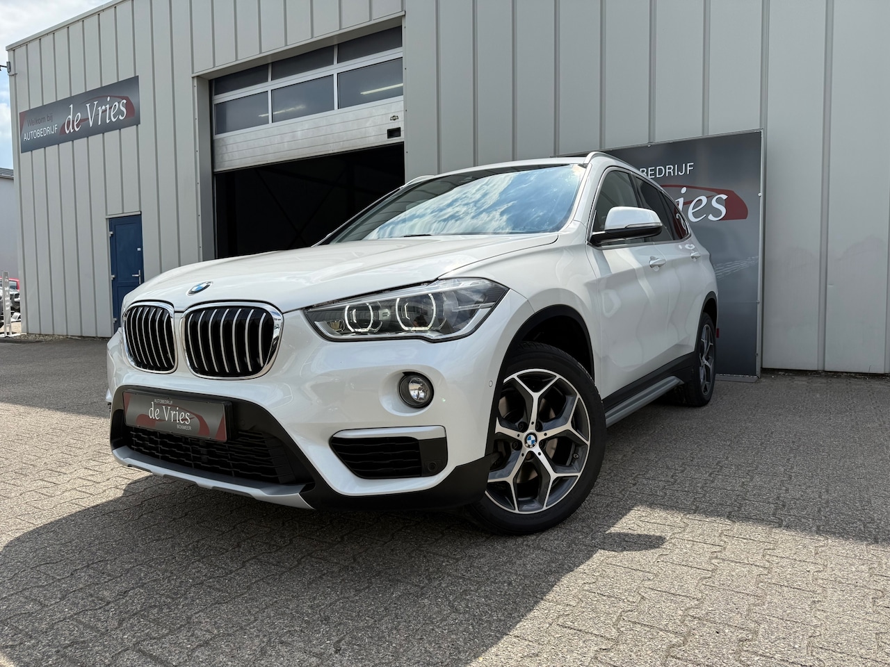BMW X1 - SDrive20i Executive / Navi / Cruise / Leder / PDC / Clima / LMV - AutoWereld.nl