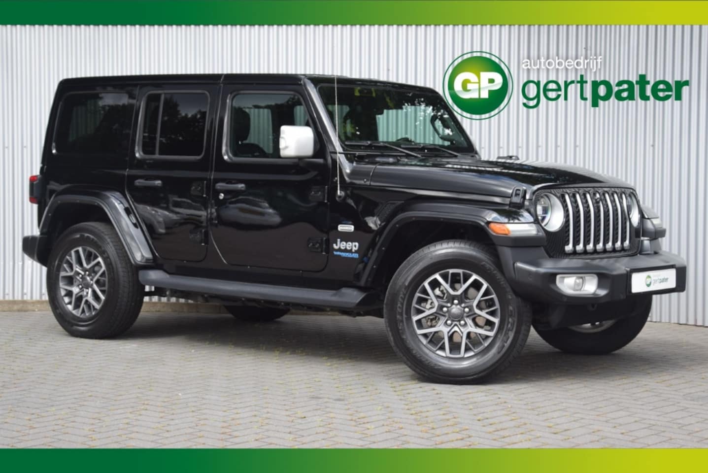 Jeep Wrangler Unlimited - 4xe 380 Sahara Hard&Softtop/Leer/Camera/AdaptiveCruise - AutoWereld.nl