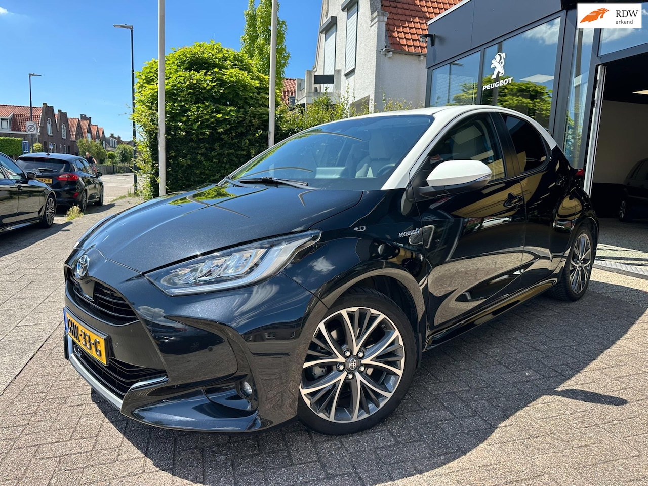 Toyota Yaris - 1.5 Hybrid Launch Edition|Half Leder|PDC|Apple CarPlay - AutoWereld.nl