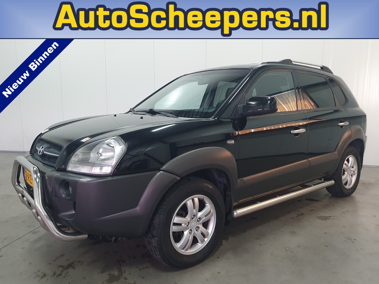 Hyundai Tucson - 2.0i Style CLIMA/CRUISE/TRHAAK/LMV - AutoWereld.nl