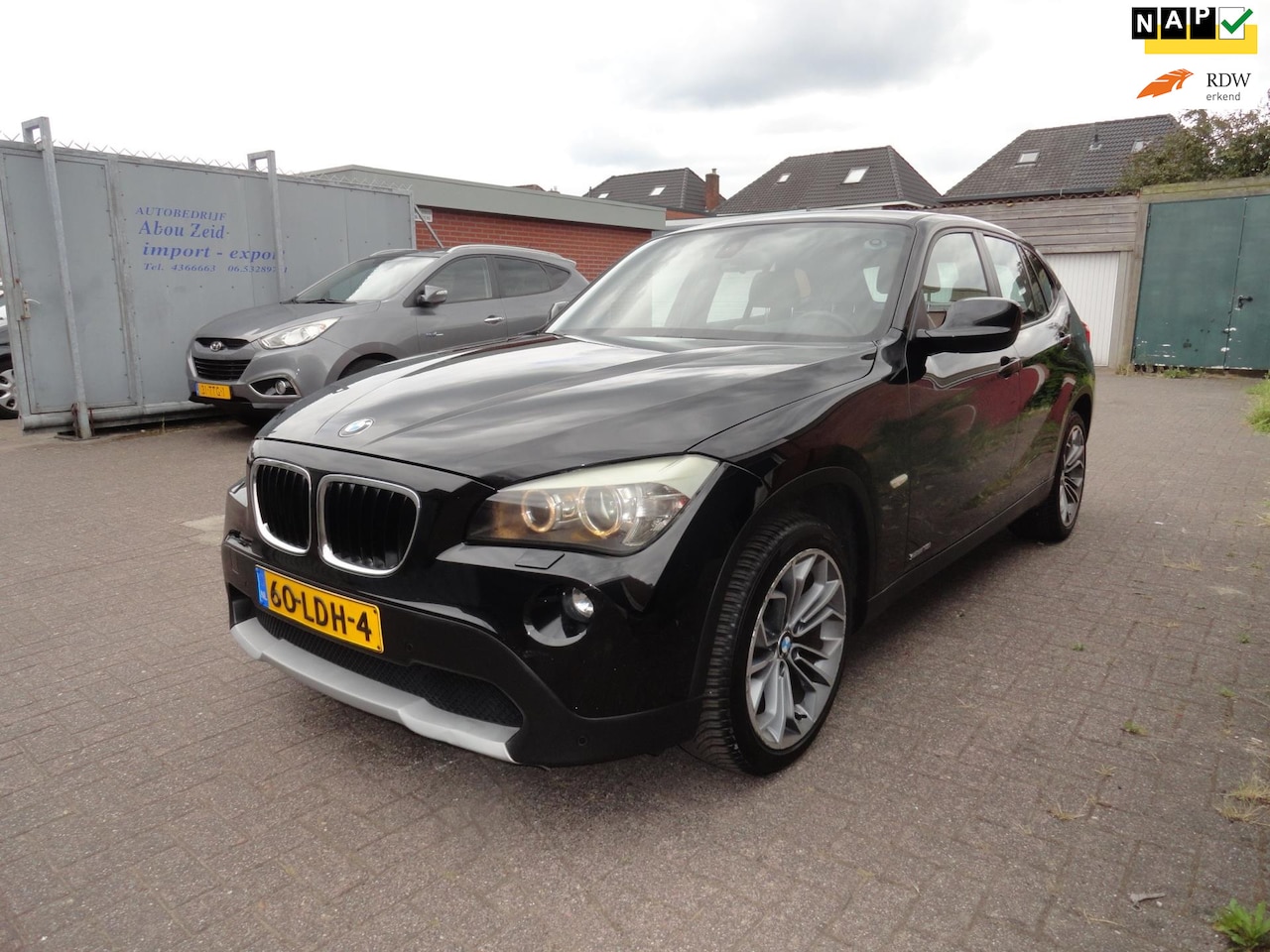 BMW X1 - SDrive18i AUT Executive (KM 178977 NAP LEER CLIMA) - AutoWereld.nl